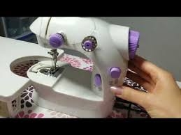 Mini maquina de coser  en santo domingo este