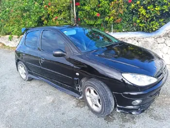 Vendo peugeot 205 negociable por viaje  en la altagracia