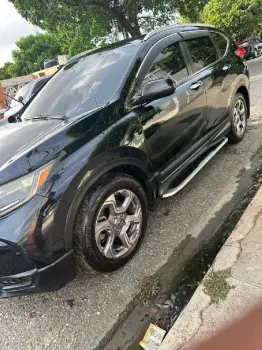 Modelo crv lx 4x4 marca honda  año 2019  colo negro fuerza motriz 2400