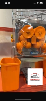 Exprimidor de naranja automático