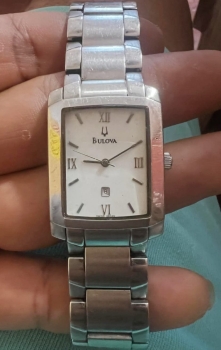 Reloj bulova cuarzo japonésac/inox fechero usado