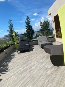 Amueblado apartamento en exclusiva torre piantini
