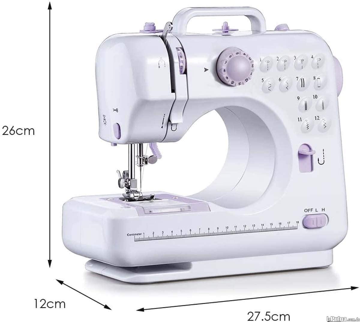 Máquina de coser portátil máquina de coser eléctrica para el hogar Foto 6966989-1.jpg