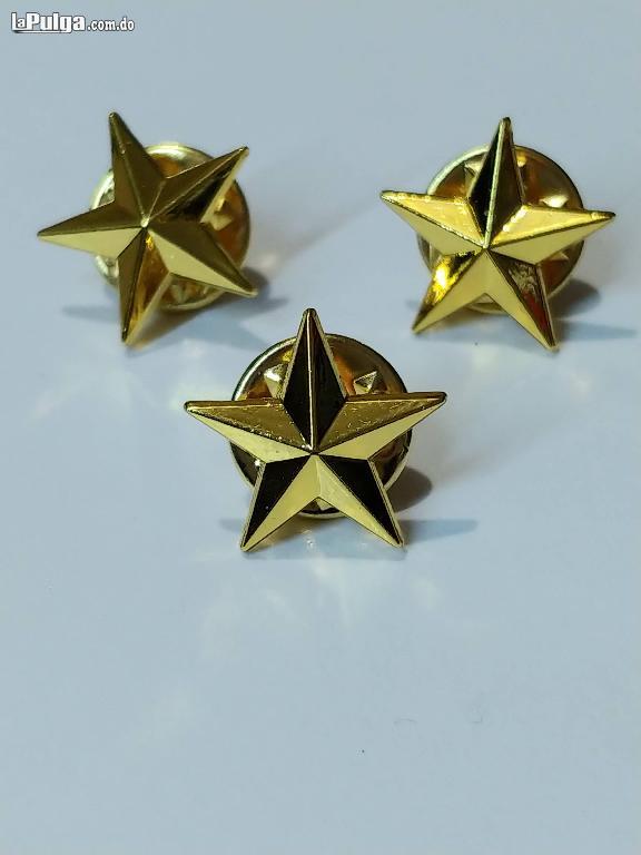 Pin de estrella dorada en metal  Foto 7127871-3.jpg