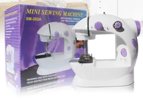 Mini máquina de coser  Foto 7174594-1.jpg