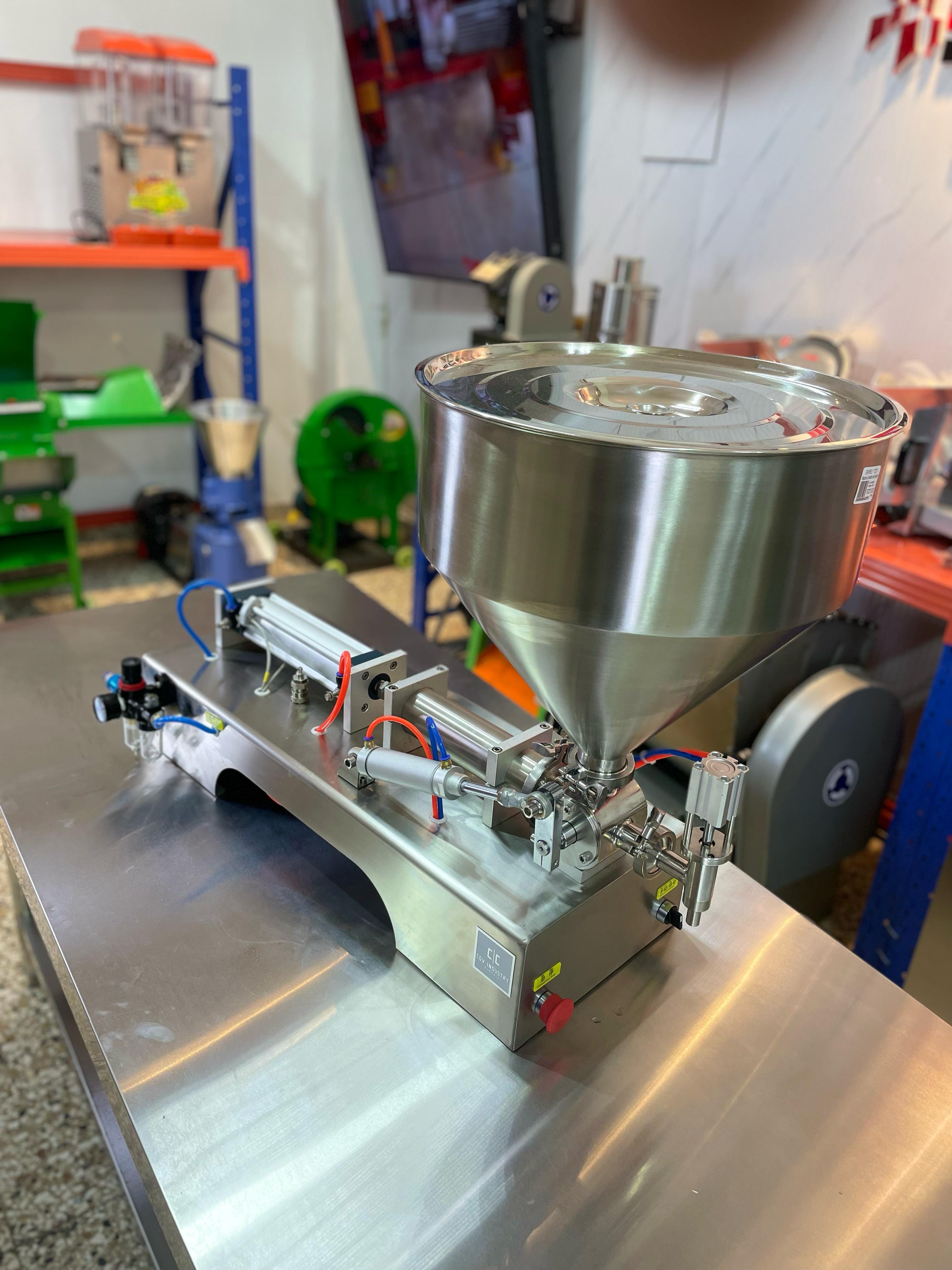 Llenadora automatica de liquidos viscosos shampoo miel jugo aceite sal Foto 7271627-2.jpg